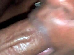 Watch a black slut get her throat fucked by a big white cock