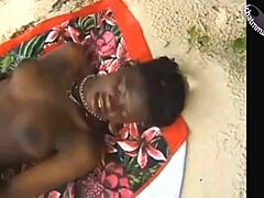 Black beauty gets her ass pounded on the beach in this vintage video