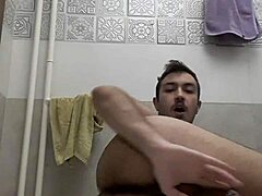 Horny gay teen's self-pleasure session with condom
