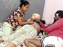 Indian housewife and stepsister engage in threesome with another woman