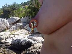 Public beach sex with a MILF with big nipples and huge breasts