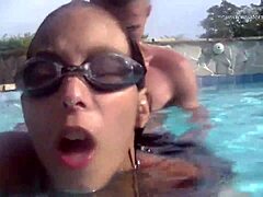 Pornstar gets her ass licked in public pool