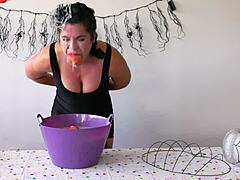 Brunette MILF gets facial at Halloween party